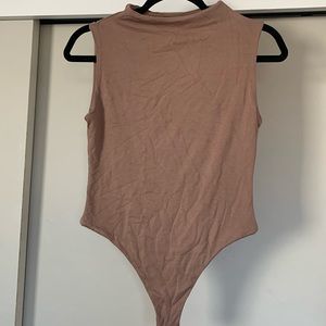Naked wardrobe sleeveless bodysuit